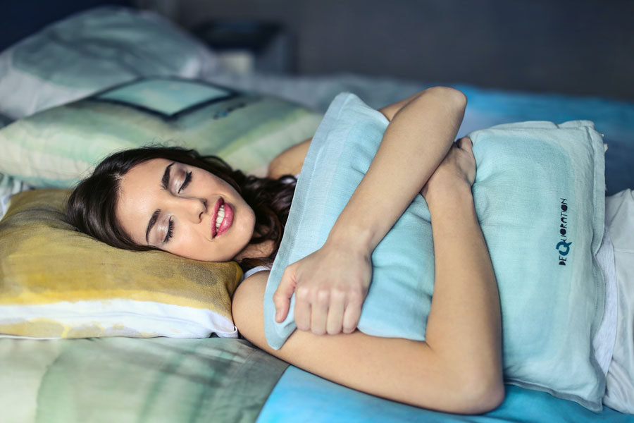 Cheryl-Sindell-Lifestyle-Article-women-hugging-pillow-good-night-sleep-relieves-stress